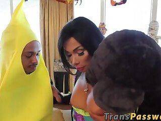 Sensual Tgirl pleases two perverted men at a costume party - ashemaletube.com